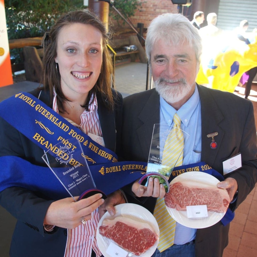 Andrews Meat Industries Kylie Schuller and head judge Russell Smith with the winning Tajima and Shiro Kin Wagyu samples at Friday's branded beef awards
