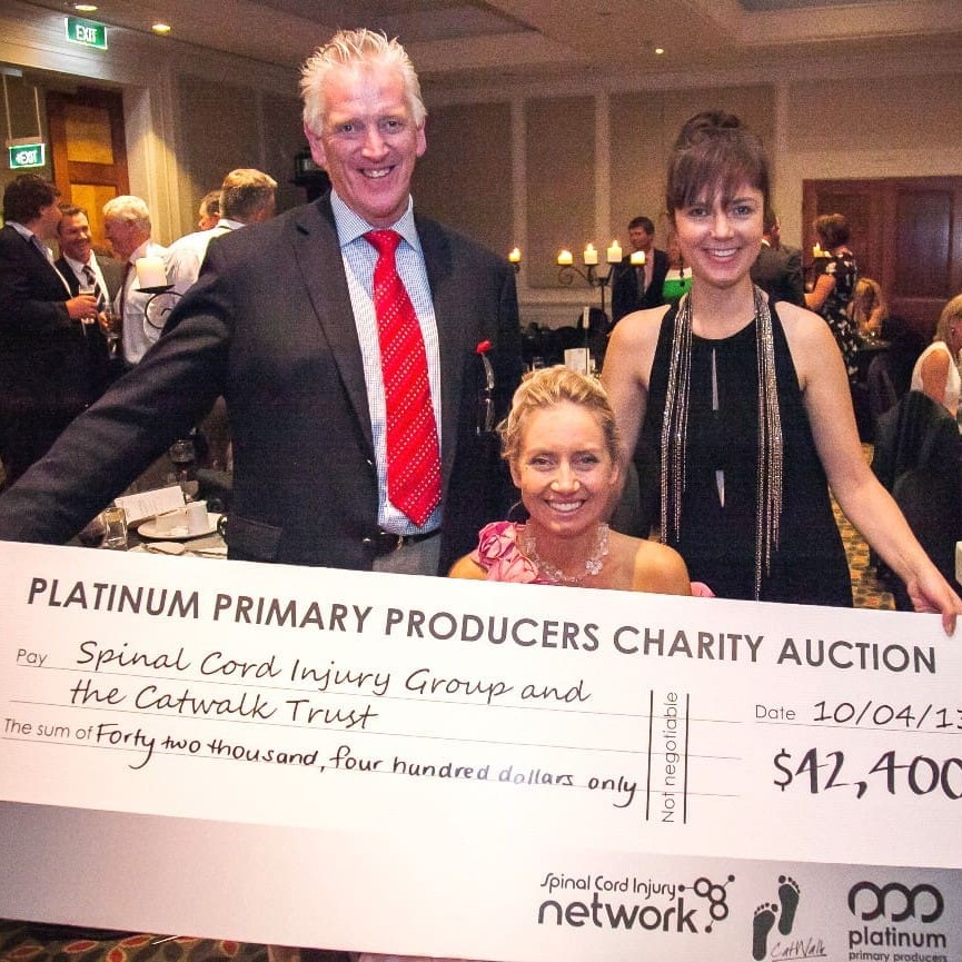 PPP's Shane McManaway, with Catriona and Stephanie Williams during the $42,000 cheque presentation