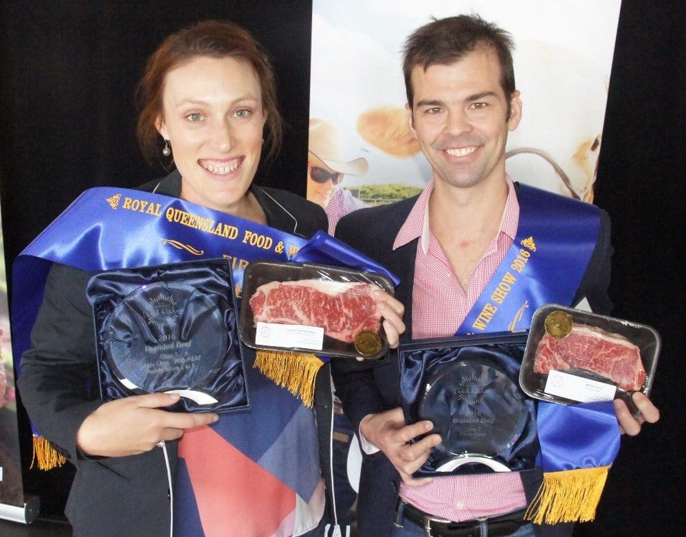 Andrews Meats' Kylie Schuller and JBS Australia's Brad de Luca with their respective Wagyu and open class-winning entries