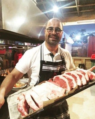 Middle Eastern Master Chef, Tarek Ibrahim, with a tray of Stockyard sirloins being prepared for filming during his recent Australian visit