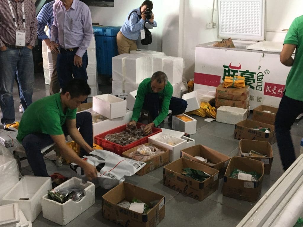 Beef orders being prepared for despatch in an e-commerce business near Shanghai