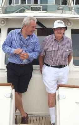 Leo Pugh with industry colleague Richard Rains in Richard's boat, Post Office. Leo loved his own boat, kept moored at Manly.
